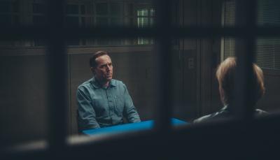 Ben Miller as Professor T receiving a visitor in jail in 'Professor T' Season 3 
