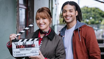 Jane Seymour and Rohan Nedd pose with the clapper to mark the start of Harry Wild Season 4 filming