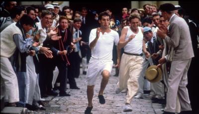 Picture shows: Athletes Harold M. Abrahams (Ben Cross) and Lord Andrew Lindsay (Nigel Havers) in Trinity College's Quad Run, surrounded by an enthusiastic crowd