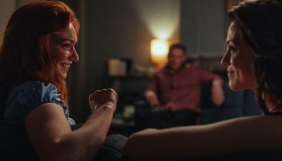 Eleanor Tomlinson as Evie, Sam Heughan as Danny, and Jessica De Gouw as Becka in 'The Couple Next Door' Season 1