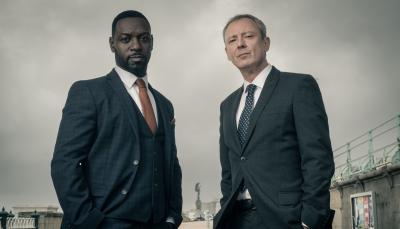 John Simm as DI Roy Grace and Richie Campbell as DS Glenn Branson in 'Grace' Season 5