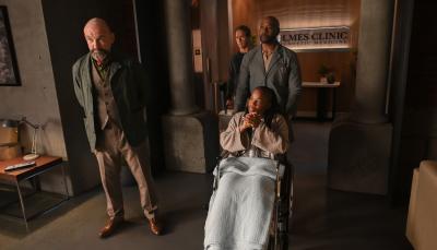 Ritchie Coster as Shinwell Johnson, Nat Faxon as Hobie McSorley, Morris Chestnut as Dr. John Watson, and Brittany Adebumola as Taryn Hines in 'Watson' Season 1