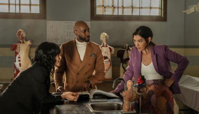 Eve Harlow as Dr. Ingrid Derian, Morris Chestnut as Dr. John Watson, and Inga Schlingmann as Dr. Sasha Lubbock in 'Watson' Season 1