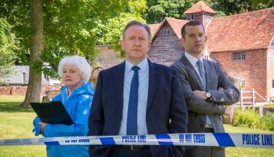 Annette Badland as Fleur Perkins, Neil Dudgeon as DCI John Barnaby, and Nick Hendrix as DS Jamie Winter in Midsomer Murders Season 23. 