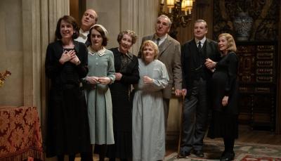 Raquel Cassidy as Baxter, Kevin Doyle as Molesley, Sophie McShera as Daisy, Phyllis Logan as Mrs. Hughes, Lesley Nicol as Mrs. Patmore, Jim Carter as Mr. Carson, Brendan Coyle as Bates and Joanne Froggatt as Anna in 'Downton Abbey: The Grand Finale'