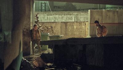 Shazad Latif as JJ and Alfie Allen as Max in 'Atomic'