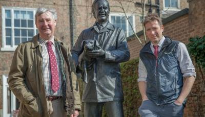 Carrying on the tradition of all things great and small; veterinarians Peter Wright and Julian Norton with the statue of their mentor, James Herriot. © Daisybeck Studios/Channel 5