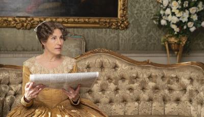 Tamsin Greig as Anne Trenchard reads the newspaper in 'Belgravia' Season 1
