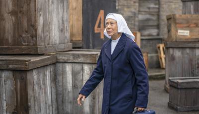Sister Julienne (Jenny Agutter) goes to visit a new patient   (Photo credit: Courtesy of BBC / Neal Street Productions