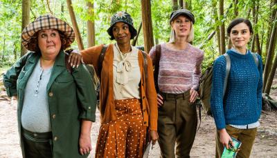 Sharron Matthews as Flo, Chantel Riley as Trudy, Lauren Lee Smith as Frankie, and Rebecca Liddiard as Mary in The Frankie Drake Mysteries