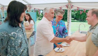Picture shows: Jurgen gets a Hollywood Handshake on GBBO's German Week 