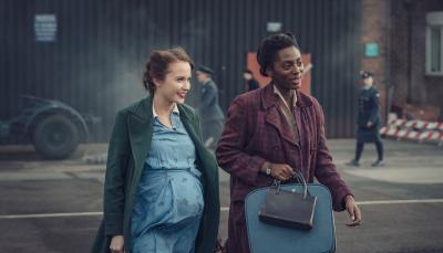 Julia Brown as Lois Bennett and Yrsa Daley-Ward as Connie Knight walk through the RAF base in 'World on Fire' Season 1