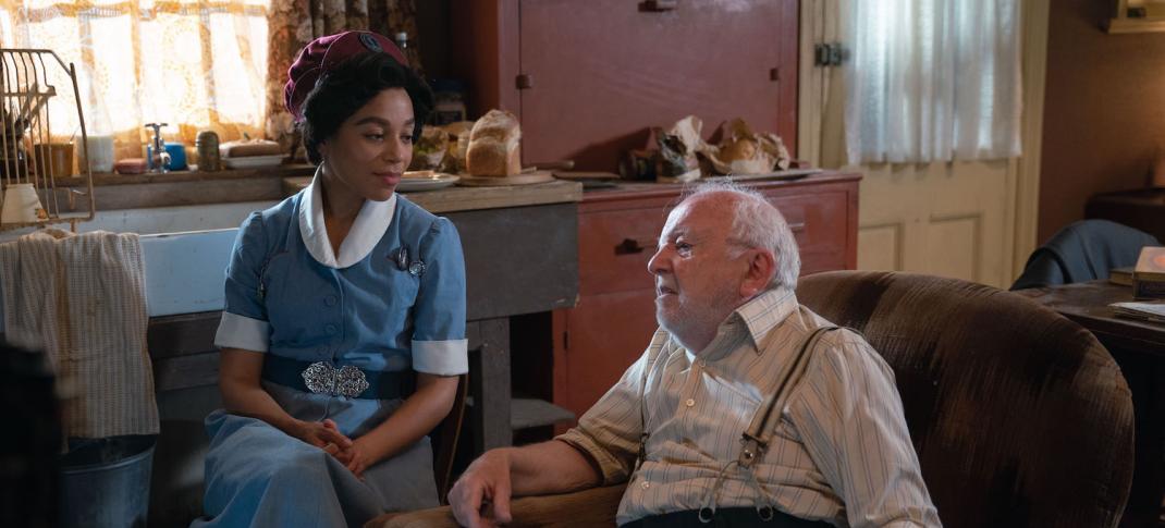 Picture shows: Nurse Lucille Robinson (Leonie Elliott) talks with her patient Tommy Woodleigh (Barry McCarthy) in his cluttered kitchen. They both look thoughtful.