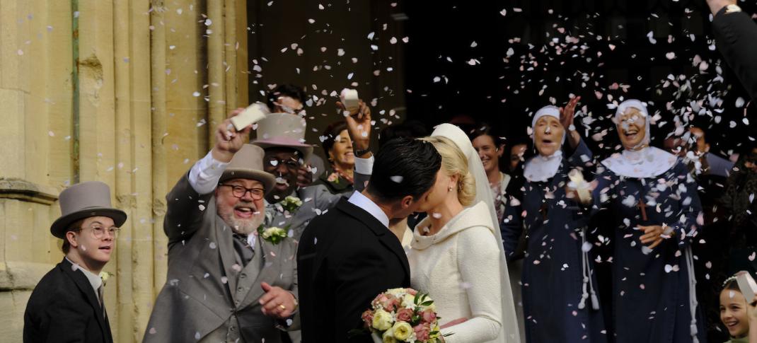 Picture shows: Outside the church the air is filled with confetti as newlyweds Matthew Aylward (Olly Rix) and Nurse Trixie Franklin (Helen George) kiss, surrounded by friends.