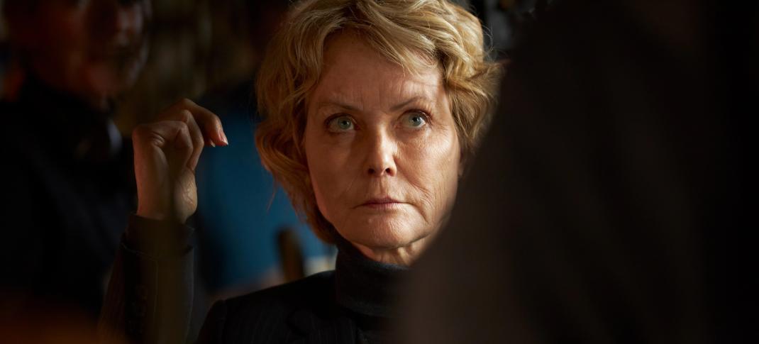 Jenny Seagrove stars as Kate Rafter, staring up at shadowy figures in ‘My Sister’s Bones’
