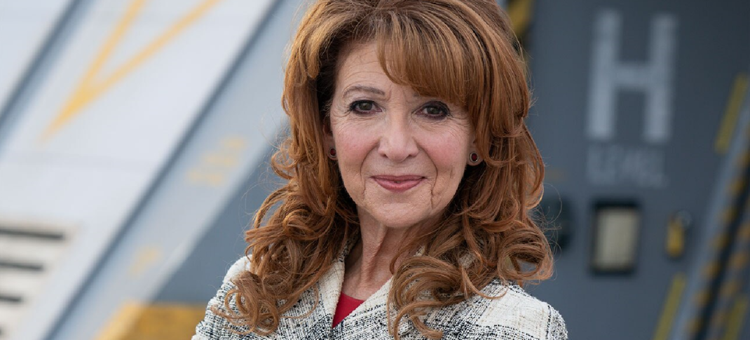 Bonnie Langford poses with her arms folded