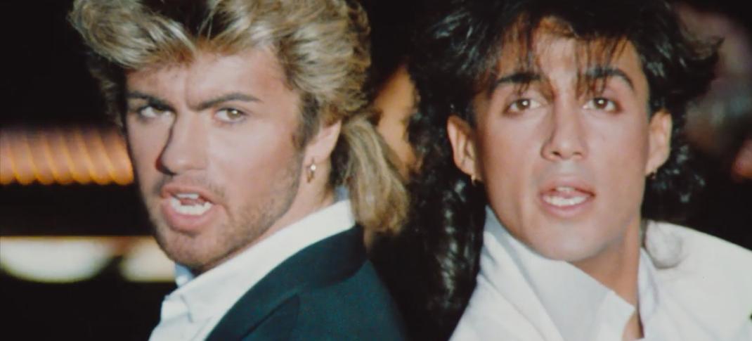 George Michael and Andrew Ridgeley pose with big fluffy 1980s hairdos in Wham!