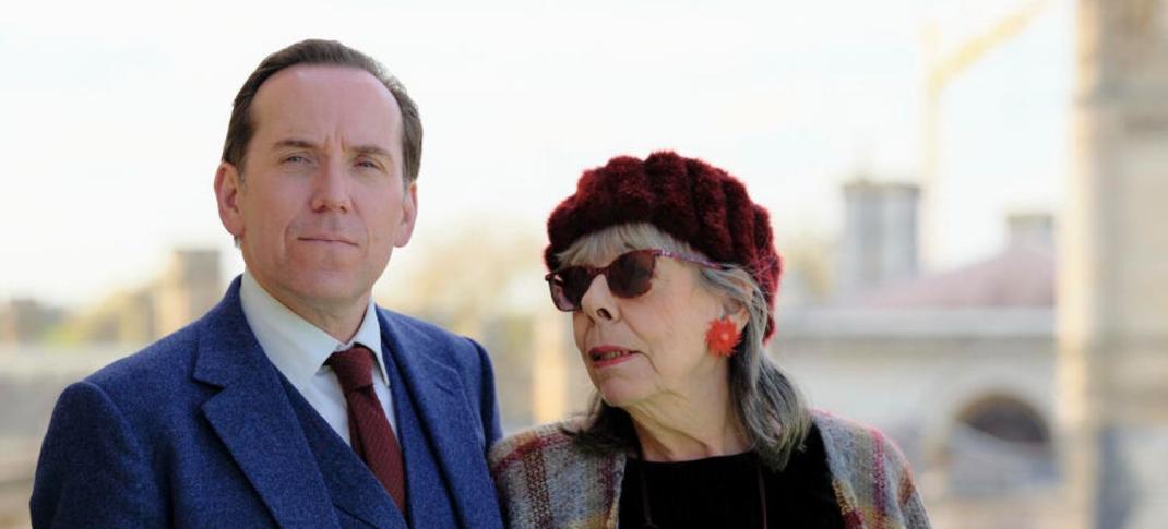 Ben Miller as Professor Jasper Tempest stands stiffly while Frances de la Tour as his mother, Adelaide Tempest, judges him in 'Professor T' Season 2