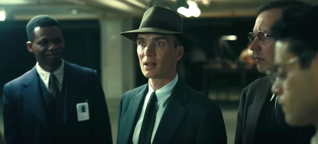 Cillian Murphy as Robert Oppenheimer addresses a group of scientists in Oppenheimer