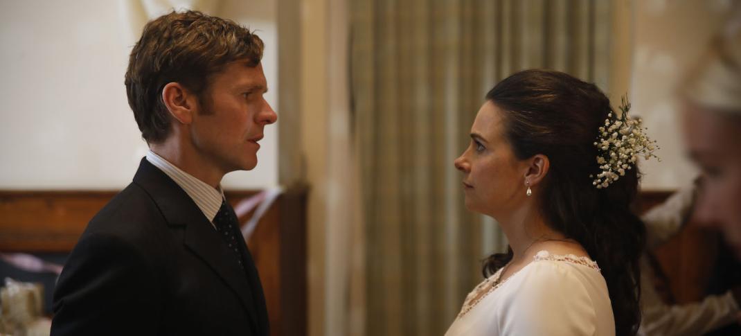 Picture shows: Endeavour (Sean Evans) and Joan Thursday (Sara Vickers) look intently at each other. She's wearing a wedding dress.