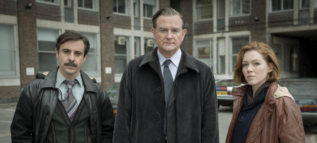 Emun Elliot as Tony Brightwell, Hugh Bonneville as Brian Boyce, Charlotte Spencer as Nicki Jennings pose outside the police precinct in 'The Gold'