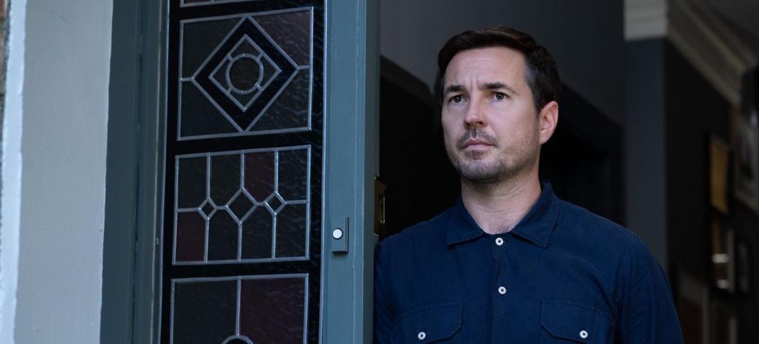 Picture shows: Bram Lawson (Martin Compston) at the front door of his house.