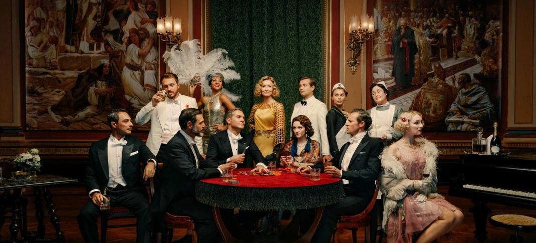 The cast of Hotel Portofino Season 2 around a poker table.