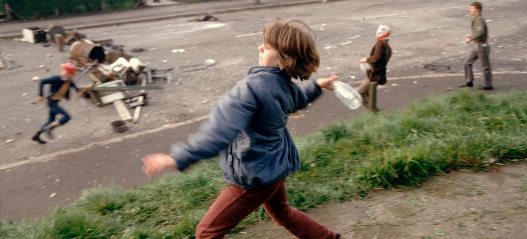 Anne Marie, aged 10, throwing bottles at British troops during a riot in Belfast, Northern Ireland, in 1981.
