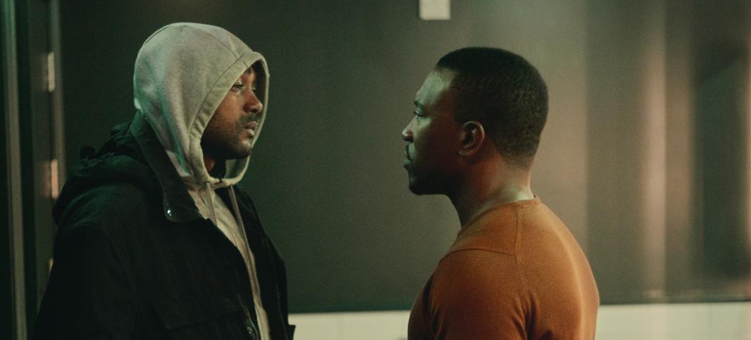 Kane Robinson as Sully and Ashley Walters as Dushane stand off in an alley in Top Boy Season 3 