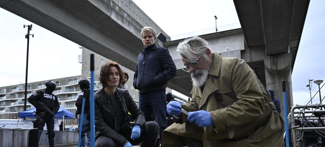 Picture shows: Lucienne Hassell (Maimie McCoy), Piet Van der Valk (Marc Warren), and pathologist Hendrik Davie (Darrell D'Silva) investigate a blood sample found near the scene of the murder. 