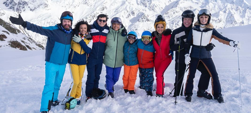 Daniel Mays, Angela Griffin, Asa Butterfield, Cora Kirk, Natalie Gumede, Alex Jennings, and Jane Krakowski on the ski slopes in 'Your Christmas Or Mine 2'