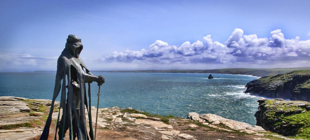 Picture shows: On a rocky promontory in Tintagel, Cornwall, a location long associated with King Arthur, the bronze statue by Welsh sculptor Rubin Eynon named 'Gallos' (power in the Cornish language) looks out over the Atlantic Ocean.