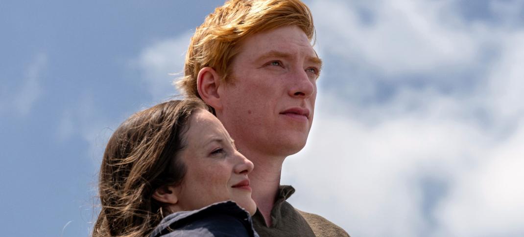 Andrea Riseborough as Alice and Domhnall Gleeson as Jack embrace in 'Alice & Jack'