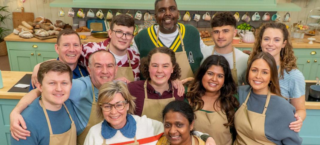 The 2023 Contestants pose in the tent for The Great British Baking Show Season 14