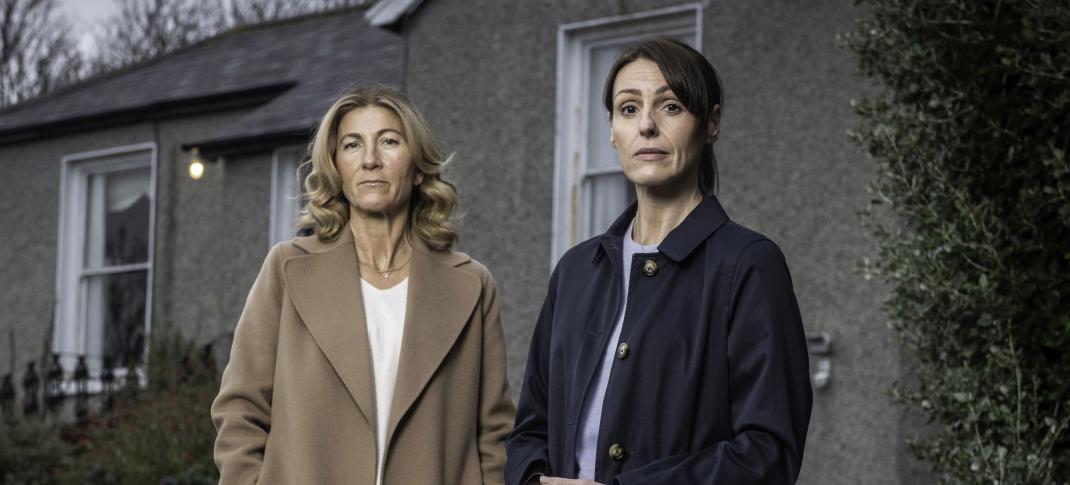 Eve Best as Rosaline and Suranne Jones as Becca stand outside their house in 'MaryLand'