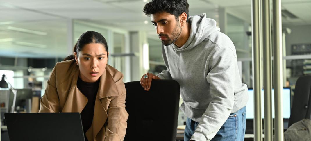 Picture shows: Citra Li (Django Chan-Reeves) and Eddie Suleman (Azan Ahmed) at work. They're both looking at a laptop and have found something significant.
