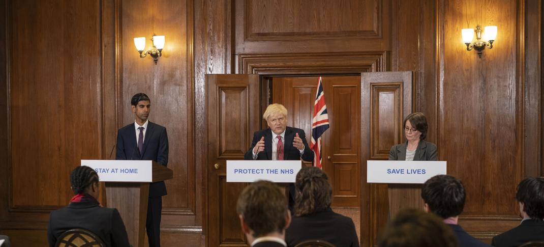 Shri Patel as Rishi Sunak, Kenneth Branagh as Boris Johnson at their podiums in 'This England'