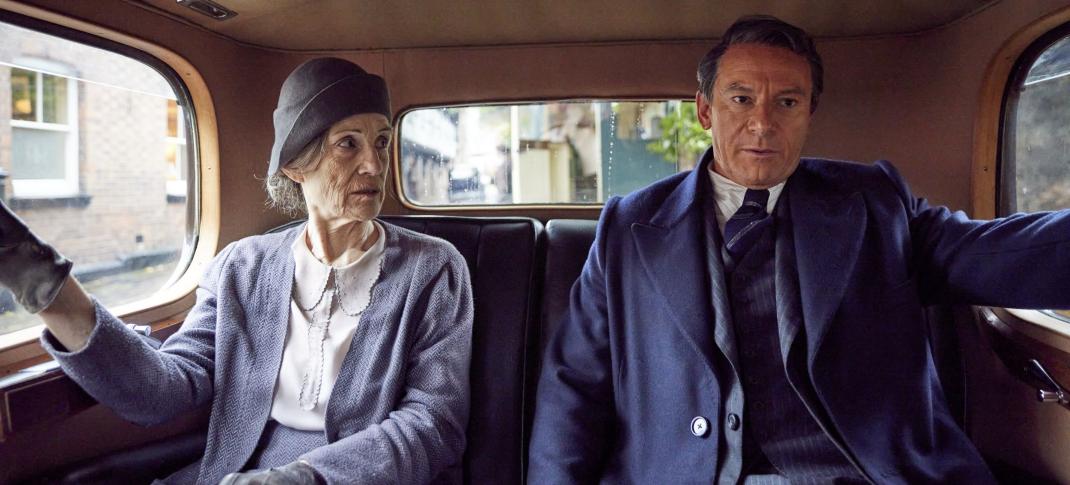 Harriet Walter as Elsie Leach, Jason Isaacs as Archie Leach aka Cary Grant riding in a car in 'Archie'