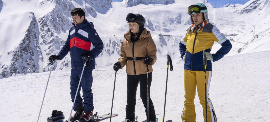 Asa Butterfield as James Hughes, Rhea Norwood as Bea Evrington, and Cora Kirk as Hayley Taylor hit the slopes in 'Your Christmas or Mine 2'