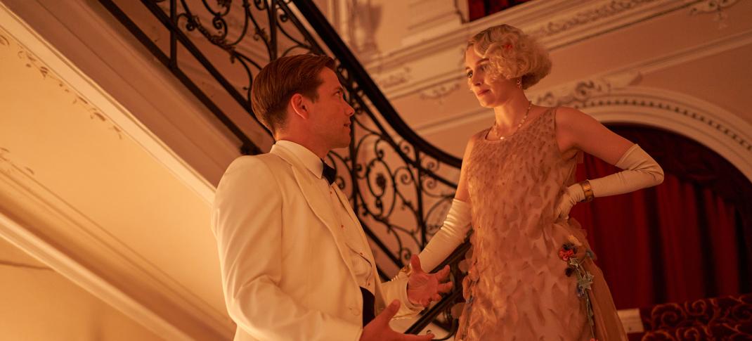 Oliver Dench as Lucian Ainsworth and Claude Scott-Mitchell as Rose on the stairs in Hotel Portofino Season 2