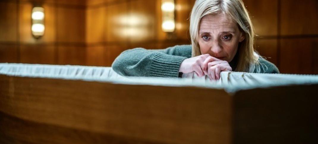 Anne Marie Duff as Susannah Frater crying over her daughter's coffin in 'Suspect' Season 1