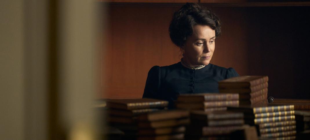 Keeley Hawes as Cassandra Austen looks through her sister's books in 'Miss Austen'