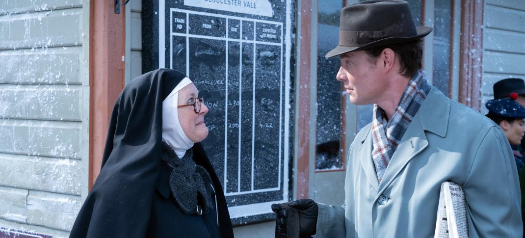 Lorna Watson as Sister Boniface and Max Brown as DI Sam Gillespie consult in the snow in 'Sister Boniface Mysteries' Season 3 Christmas Special