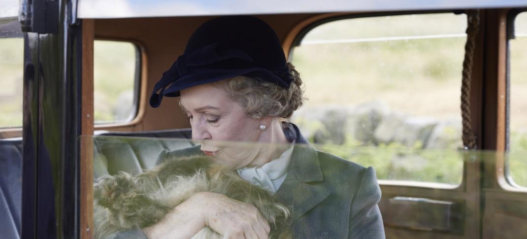 Picture shows: Mrs. Pumphrey (Patricia Hodge) sits in her car with Tricki Woo