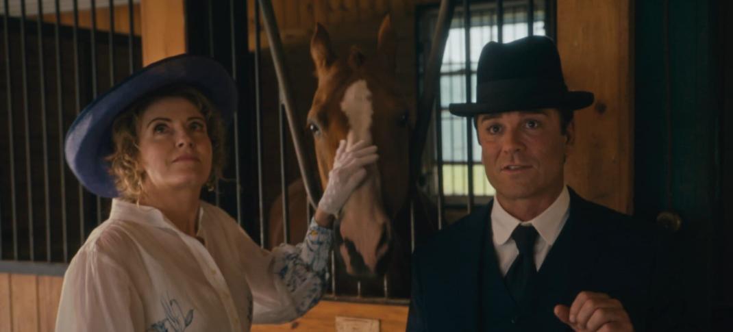 Hélène Joy as Dr. Julia Ogden and Yannick Bisson as Det William Murdoch hang out with a horse in 'Murdoch Mysteries' Season 17