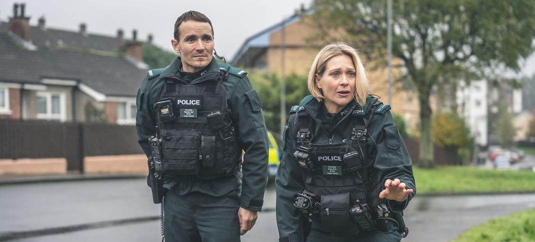 Martin McCann as Stevie Neil and Siân Brooke as Grace Ellis on patrol in 'Blue Lights' Season 2