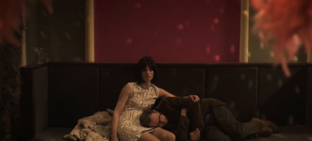 Gemma Arterton as Barbara and Leo Bill as Tony tripping at a club in Funny Woman Season 1