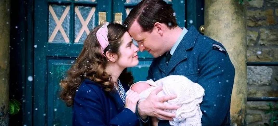 Rachel Shenton as Helen Herriot and Nicholas Ralph as James Herriot hold their newborn in 'All Creatures Great and Small' Season 4