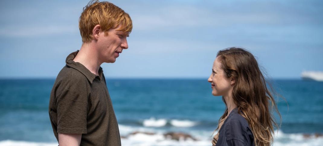 Andrea Riseborough and Domhnall Gleeson as the titular 'Alice & Jack' on the beach