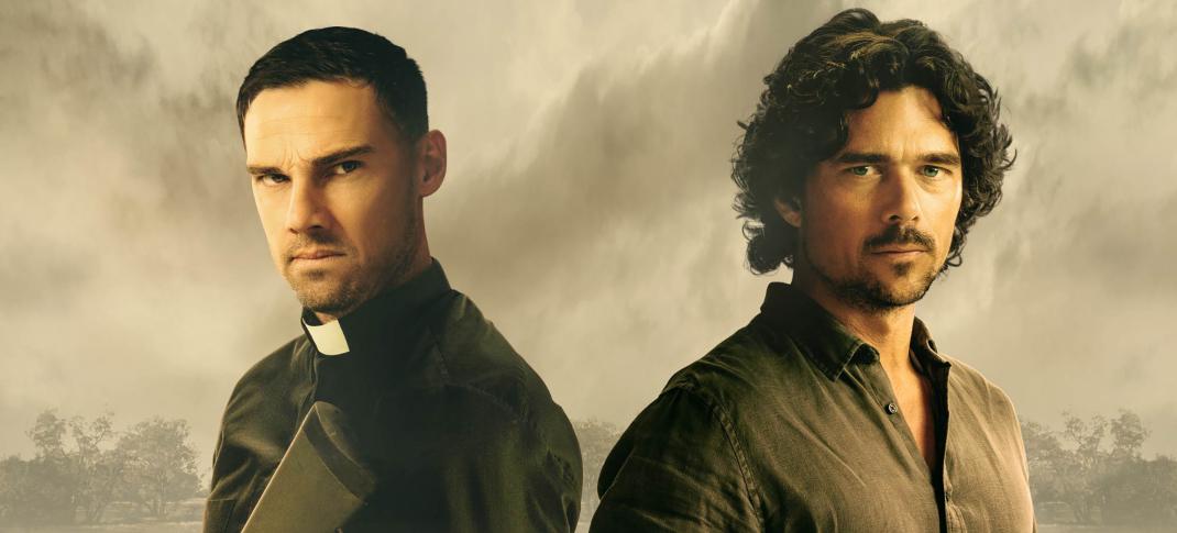 Jay Ryan as Father Byron Swift and Luke Arnold as Martin Scarsden pose in 'Scrublands' Season 1 